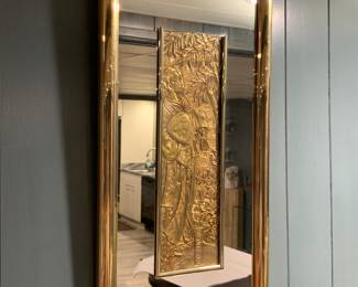 Vintage gold wall mirror with Asian carving insert