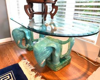 Vintage Hollywood Regency elephant and glass coffee table