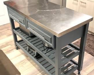 Very nice kitchen island on wheels with ample storage
