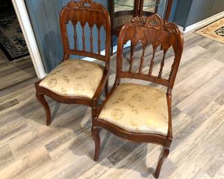 Matching hand carved wood chairs