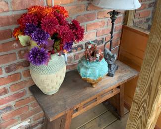 Rustic bench, vase, lamp