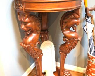 Figural carved marble top table