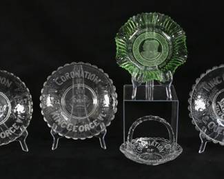 35	5 Pieces Coronation & Jubilee Commemorative Glass	5 piece glass lot. King George VI and Queen Elizabeth Coronation, 1937 green glass plate with ruffled rim, 9"-diameter; 2 pressed glass plates Coronation of King George IV, 1937, larger 10"-diameter; Coronation of King George IV, 1937 basket, 5 5/8"H; King George V & Queen Mary Silver Jubilee, 1935 pressed glass plate, 10 1/4"-diameter.
