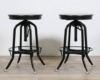 286	Pair of Restoration Hardware Revolving Barstools	"Pair of Restoration Hardware revolving barstools. Wood swivel tops and metal bases. No apparent labels or maker's marks. Scratches and scuffs to wood on both tops. Wear, scratches, and marks throughout metal on both stools. Height is only adjustable on one stool. Spring mechanism for height adjustment is missing on one stool. 

25"" H x 15 3/4"" diameter. Tallest possible height is 29 1/2"" H. Each stool weighs 19 lbs."
