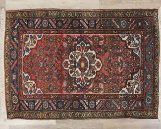 407	Persian Style Rug	"Persian style rug. Floral medallion and motifs against polychromatic field. Fading and wear throughout rug and fringe. Slight warping throughout. 

3' 6"" x 5' 1"". 10 lbs."
