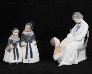 25	2 Porcelain Figures B&G & Copenhagen	2 porcelain figure groups. Royal Copenhagen no. 1316 Amager Girls, 7 1/4"H; Bing & Grondahl no. 1642 Dickie's Mama mother and child, 9"H. Chip to chair leg and repair to mother's arm on B&G figure.
