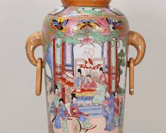 179	Chinese Porcelain Lamp	Chinese porcelain lamp, with flowers, butterflies and figures in temple scenes, figural elephant handles. 26 1/2"H. Paint loss and paint drops on handles.
