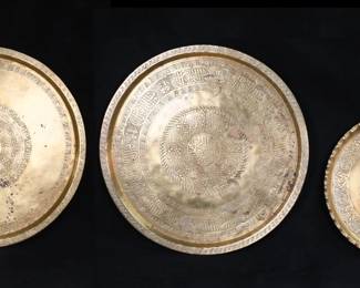 371	3 Persian Brass Trays	3 Persian brass trays. Largest 20 3/4"-diameter. All with discoloration, tarnishing and losses to brass patina.
