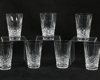 148	11 Waterford Crystal Kenmare Tumblers	11 pieces signed Waterford crystal stemware. Tumblers / highball glasses in the Kenmare pattern. All with etched Waterford marks. 10 each 5"H, one smaller diameter and 4 7/8"H. One chipped on the rim.
