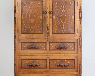 48	Aesthetic Movement Inlaid Gentleman's Chest	"Aesthetic Movement parquetry inlaid gentleman's chest or dresser. 19th century. Five drawers, two doors, ornately carved drawer pulls. Scuffs and wear throughout wood of exterior. Scratches and marks to shelves and interior. Scuffs and nicks to wood on left and right sides of bottom. Long gouge to wood near bottom on right side of chest. 

40"" W x 16"" D x 65 1/4"" H. 136 lbs.

"
