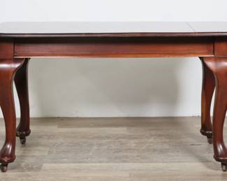 298	Victorian Pad Foot Desk	"Victorian pad foot desk or table. Late 19th/early 20th century. Mahogany, large cabriole legs, pad feet on casters. Large splits and cracks to wood on top of desk on left and right sides. Scratches, scuffs, and wear throughout legs and feet. Scuffs and nicks to edges of top. 

53 3/4"" W x 30"" W x 29"" H. 70 lbs."
