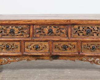 172	Chinese Low Altar Form Cabinet	"Chinese low altar form cabinet. Seven drawers and carved floral fretwork on molding and apron. Large split and crack across top. Repairs to fretwork on apron on right side. Refinishing throughout cabinet. Wear, marks, and scratches throughout wood. 

48 3/8"" W x 12 1/4"" D x 17 1/4"" H. 45 lbs."
