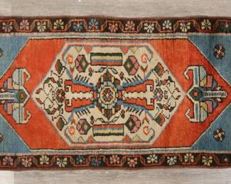 405	Turkish Style Prayer Rug	"Turkish style prayer rug. Diamond-form medallion against blue and orange field. Fading, wear, and pilling throughout rug. Losses, tattering and wear to fringed edges. 

2' 1/4"" x 3' 10"". 4 lbs."
