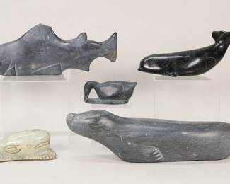 369	5 Inuit Stone Carvings Animals	Lot of Inuit carvings. 5 carved stone animal sculptures. Whale, signed Guy Maclure, 7 1/4"L; whale, signed illegibly, 7 1/2"L; seal, signed, 15"L; duck, signed, 4"L; shark, signed, 11"L. Maclure whale minor chips to tail, black whale chips to tail and fins, seal chips to tail, shark large chips to top fin and tail fin.
