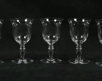 146	7 Baccarat Crystal Provence Port Wines	7 pieces Baccarat crystal stemware. Port wines in the Provence pattern, each 4 7/8"H. All with etched Baccarat France marks to the undersides. 2 with rim chips.
