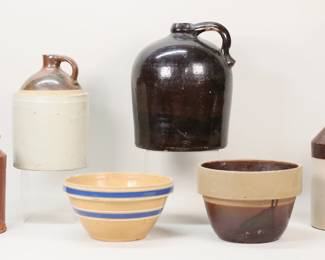 74	6 Pieces Stoneware Jugs, Bowls, Crock	"6 piece stoneware pottery lot. Brown glazed jug, 11 3/4""H; 2 jugs, taller signed RCP Akron, OH, 11 1/2""H; yellow ware bowl, 5""H x 9 1/2""-diameter; planter, 6 3/8""H x 9""-diameter; terracotta crock, 8 5/8""H.

Brown glazed jug handle repair, chips and losses to glaze, chip to base of handle; RCP jug small chip to spout and chips to rim; smaller jug chips to spout and rim, chips to base; yellowware bowl chips to base and chips to bottom of rim, staining to interior; planter line from rim into body; crock lines throughout body."
