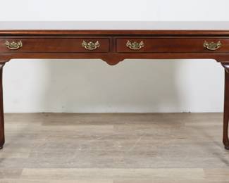 219	Stickley Queen Anne Style Mahogany Console	"Stickley Queen Anne style mahogany console. Circa 1990. Two drawers, pad feet, cabriole legs. Stickley brand mark, L & J.G. Stickley label, and ""A Leopold Stickley Original"" label on inside of left drawer. Wear, scratches, marks and scuffs throughout top of console. Small losses to wood on top edges. Scuffs, marks and wear to legs. 

54"" W x 16"" D x 28 1/4"" H. 45 lbs."
