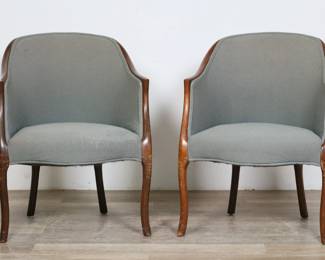 281	Pair of French Art Deco Style Barrel Back Chairs	"Pair of French Art Deco style barrel back chairs. 20th century. Bergere form armchairs with mint green upholstery. Manufacturer label with ""Carlo R."" on underside of one chair. Heavy staining to upholstery on seat of one chair. Heavy scratches, scuffs, nicks, and chips to wood along arms, legs and frames of both chairs. Wear and pilling throughout upholstery. 

24 1/2"" W x 25"" D x 33"" H. Each chair weighs 20 lbs. 

"
