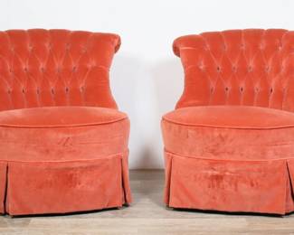 161	Pair of Art Deco Style Velvet Lounge Chairs	"Pair of Art Deco style velvet lounge chairs. 20th century. Dark pink velvet upholstery in channel back form. Heavy wear and fading throughout velvet on both chairs. Staining to skirt on front of one chair. Tears to velvet on seating of both chairs. Wooden caps placed on legs of chairs for height extension. 

31 1/2"" W x 29 1/2"" D x 31 1/4"" H. 80 lbs total."
