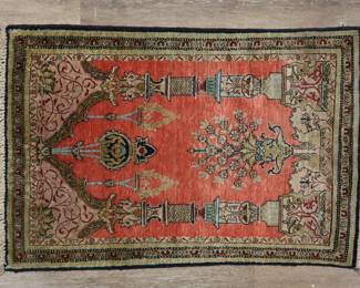 350	Persian Tabriz Style Prayer Rug	"Persian Tabriz style prayer rug. Columns, chandeliers, and griffins against pink and floral field. Label on underside of rug on one corner. Losses and tattering to fringed edges. Fading and slight warping throughout rug. 

2' 2"" x 3' 1 5/8"". 3 lbs."
