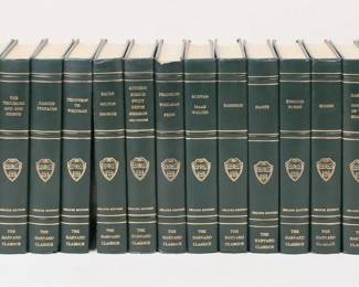 386	22 Volumes The Harvard Classics	22 volumes Harvard Classics leather bound books, P.F. Collier & Son Corporation, New York, 62nd printing, 1969. Including: Bacon Milton Browne, English Essays, Franklin & Penn, Cervantes, R.H. Dana Jr. Two Years Before the Mast, American Historical Documents, Walton & Bunyan, Ralph Waldo Emerson Essays & English Traits, Stories From the Thousand and One Nights, Prefaces & Prologues, English Poetry (3 volumes), The Divine Comedy, Edmund Burke, The Odyssey of Homer, Folklore & Fable, Charles Darwin The Voyage of Beagle, Plato, Plutarch's Lives, Essays English & American, Elizabethan Drama. Each book 8 5/8" x 5 3/4". Burke first pages torn, one English Poetry spine torn, Fables spine torn, corners bumped and some with minor discoloration and scratches to covers.
