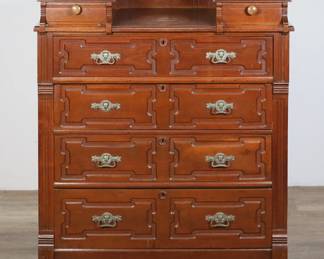 291	Victorian Egyptian Revival Chest of Drawers	"Victorian Egyptian Revival chest of drawers. Six drawers, pharaoh or sphinx-form pulls, later plastic, metal and ceramic casters. Wear, staining, scuffs, and marks to wood throughout top of chest. Nicks and scratches to wood on left and right sides. Nicks and scuffs to front apron and sides. Scratches and small chips to drawer fronts. Crack to wood on back paneling. Drilled holes on wood of backsplash. One pull missing from one drawer. Hairline crack to wood on lower right side.

37 1/4"" W x 19"" D x 44 1/8"" H. 95 lbs.

"
