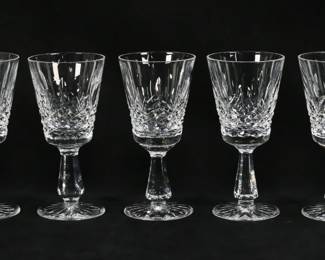 149	7 Waterford Crystal Kenmare Claret Wines	7 pieces signed Waterford crystal stemware. Claret wines in the Kenmare pattern. All with etched Waterford marks. Each 6"H. One chipped on the stem.
