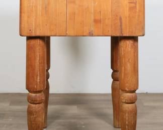93	American Maple Butcher Block	"American maple butcher block. 19th century. Block form top on turned legs. Stains, wear, scratches, and marks throughout wood. Splits to wood on legs and top. One leg is slightly loose. 

24 3/8"" W x 24 1/4"" x 34 1/4"" H. 187 lbs."
