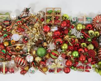 86	Lot of Christmas Ornaments	Large lot of Christmas ornaments. Mostly glass, including vintage, Slavic Treasures animals. Giraffe head 8"L.
