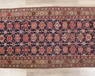 395	Persian Malayer Style Runner Rug	"Persian Malayer style runner rug. Repeating floral motifs against blue and green field. Losses and wear to fringed edges. Slight warping throughout rug. Losses and wear to color near center of rug. 

3' 5 1/8"" x 8' 10"".10 lbs."
