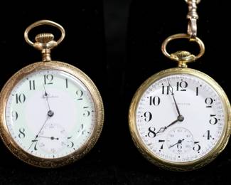 252	Two Pocket Watches Hamilton And Perfection	"Gold tone Perfection pocket watch. Minute, hour and second hands. Face marked ""Perfection"". Works marked ""Perfection USA"", ""6732869"". Back of case marked ""Philadelphia Watch Case Co Victory Warranted Ten Years 4012993""  and ""9-92AB"" in script. Hairline crack on face. Steel back of works scratched. Some nicks to back cover around edge. Running. 

Gold tone Hamilton pocket watch. Minute, hour and second hands. Face marked ""Hamilton"". Works marked ""Hamilton Watch Co. Lancaster PA  21 Jewels 992 Double Roller"", ""Adjusted 5 Positions 1715171""  ""Made in the USA"".  Back of case marked ""Keystone Watch Case J. Boss 14K Gold Filled"" ""7641274"". "" Hairline crack on face with piece missing between the 7 and 8. Dents to back of case. Back inside cover has scratch marks. Running. Comes with adjustable gold tone watch fob. 

"
