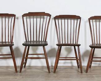96	Six Rustic Farmhouse Spindleback Chairs	"Set of six rustic farmhouse spindleback chairs. American, 19th century. Carved bentwood spindles with incised legs and stretchers. One chair with slightly tapered front stretcher. Scratches, marks, nicks and wear to wood throughout all chairs. Repair and glue remnants to spindle on one chair. Cracks and separations to carved top rails on two chairs. Metal on right side of top rail and spindle for reinforcement on one chair. Repairs to foot on one chair.

18 3/8"" W x 19"" D x 33 5/8"" H. Seat height 18"" H. Each chair weighs 8 lbs."
