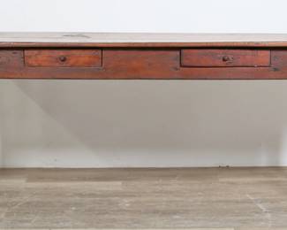 102	American Primitive Farmhouse Work Table	"American primitive farmhouse work table. 19th century. Tapered legs, two drawers, top with curved front edges. ""J.C. POWERS"" carved into top of table. Heavy scratches, marks, scuffs and wear throughout top of table. Nicks and scuffs to wood on legs. Split to wood on back of apron. Front half of table top is separated from legs. Front left leg is separating from apron and joinery.

72"" W x 23 1/4"" D x 28 3/8"" H. 59 lbs."
