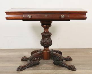 283	American Classical Carved Entryway Table	"American Classical carved entryway table. 19th century. Mahogany, one drawer with later crystal pulls, carved paw feet. Wear, marks and scratches to wood of table top. Reconstruction to drawer with later wood and particle board on sides and bottom. Scuffs, nicks, and chips to wood on feet. 

35 7/8"" W x 18 1/2"" D x 26 5/8"" H. 36 lbs."
