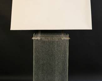 413	Robert Abbey Modern Glass Block Lamp	Robert Abbey Inc. modern glass block form table lamp, chrome and 4 textured glass panels, rectangular shade. Lamp without shade 10"W x 5 1/2"D x 29 5/8"H to top of finial. Minor fraying and discoloration to shade, indentations to shade.
