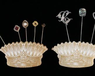 244	8 Gold & Sterling Silver Stick Pins	Lot of 8 vintage gold and silver stick pins. 3 sterling stick pins, including Mexican, 6.9 grams total; 5 gold stick pins, including 4 10k gold 4.2 grams total, and 1 14k gold, 1.9 grams total. Sterling heart 2 3/4"L.
