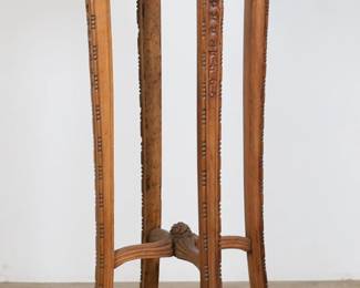 43	Louis XV Provincial Style Carved Plant Stand	"Louis XV provincial style carved plant stand or pedestal. Cabriole legs and carved acanthus form motifs. Split to wood across top. Large loss to wood on one foot. Losses to bead molding along one leg. Chips and nicks to wood on feet. Chips to edges of top. Scratches, marks and wear throughout wood. 

16 3/4"" W x 16 1/4"" D x 42 1/4"" H. 15 1/8"" diameter of top. 13 lbs."
