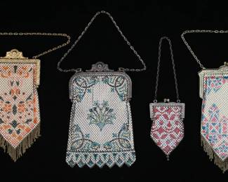 237	4 Mesh Bags Mandalian	4 mesh purses. 3 signed Mandalian Mfg. Co.: gold tone frame with geometric and floral motif in pink, orange and black, 3 1/2"W x 7 1/4"L including clasp and fringe; silver tone frame with floral motif in green, yellow and black, 4 1/8"W x 7"L; gold tone frame with pink and blue floral and geometric motif, 3 7/8"W x 7 1/4"L. One unsigned: silver tone frame with red and white geometric motif, 2 3/8" x 4"L Some losses to color on unsigned bag.
