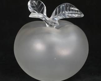 227	Lalique Grand Pomme Apple Perfume	Lalique for Nina Ricci Grande Pomme apple form frosted glass perfume bottle. Signed on the underside Lalique France. 5 1/4"H. Chip to stem on stopper, discoloration to interior.
