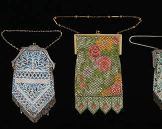 234	4 Mesh Bags Including Mandalian, Whiting & Davis	"4 mesh purses. 2 signed Mandalian Mfg. Co., both with silver tone frames and art deco floral decoration, one with two enameled teardrops on the fringe; signed Whiting & Davis Co. bag with silver tone art deco frame and rose decoration in black, pink and green; unsigned bag with gold tone frame and floral decoration. 

Both Mandalian bags losses to enamel throughout, frame bent at top on green and gold bag, blue and black bag losses to enamel on both teardrops; losses to enamel and enamel flaking off unsigned bag, Whiting & Davis bag frame bent."
