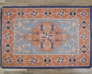 345	Anatolian Style Rug	"Anatolian style rug. Animal, human, and tree motifs against blue and orange field. Heavy fading, wear and pilling throughout rug. Wear and staining to fringe. Stain near one side of rug on inner field. Warping and creasing throughout. 

4' 2"" x 6' 1"". 5 lbs.
"
