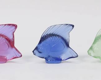 223	5 Lalique Crystal Fish Figurines	5 signed Lalique crystal fish figurines, in 5 colors. Each signed Lalique France on the base. Each 1 3/8"H. Tail fin chipped on lighter pink fish.

