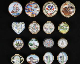 36	16 Enamel & Porcelain Boxes Including Halcyon Days	16 trinket / pill boxes. 14 enamel including 8 Bilston & Battersea Halcyon Days: may you be happy, limited edition American Revolution & The Treaty of Paris, 1789-1989 Declaration, flowers, Australia, James Madison & George Washington constitution signing, Halls Kansas City fountain, Halls Kansas City Country Club Plaza; 4 Tiffany & Co. for Halcyon Days: map, Statue of Liberty (2), Brooklyn Bridge; Toye, Kenning & Spencer clipper ship; Staffordshire pineapple. With a Limoges porcelain heart box and Framecraft porcelain box with stitched lid. American Revolution box 1 5/8"H x 2 1/4"-diameter. Lid on Limoges box repaired.
