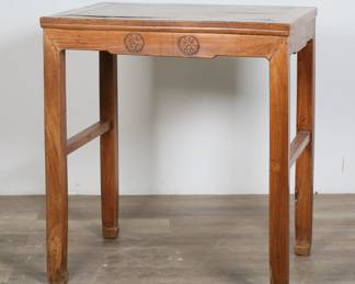 173	Chinese Qing Style Lamp Table	"Chinese Qing style lamp or side table. Horse hoof feet and Chinese characters carved into apron. Warping throughout construction of table. Splitting, marks, wear, cracks and separations to wood of top. Wear, nicks, and water damage to feet. Splitting and crack to wood on one leg. Chips and losses to wood on one foot. 

28 1/4"" W x 20 1/4"" D x 30 1/4"" H. 30 lbs."
