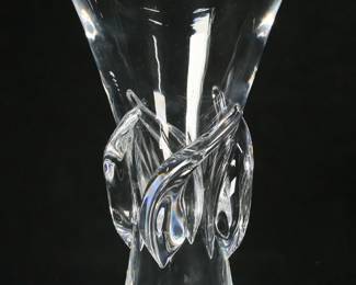 141	Steuben Crystal Rose Vase	George Thompson for Steuben modern art glass Rose vase. Signed on the underside Steuben. 11"H x 6 1/4"-diameter at top. Chips to the base, scratches to the underside.
