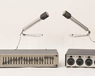 391	Audio Control Octave Equalizer, Shure Stereo Mixer	Audio Control stereo octave equalizer, serial number L11952, 17"L x 5 3/4"D x 2 3/4"H; Shure M688 stereo microphone mixer, 11 3/8"L x 7"D x 2 3/4"H; two AKG D40 microphones, with original instructions, each 7 1/2"L including stands. Equalizer and mixer both turn on, untested; microphones untested. Scratches to top and bottom of mixer, scratches to microphones.
