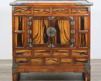 168	Chinese Tea Cupboard	"Chinese tea cupboard or clothing chest. 20th century. Four drawers and two doors revealing large central compartment. Paper with Chinese characters lines interior of cabinet. Scuffs, marks and wear throughout wood of top. Splits to wood on paneling of top. Chips and losses to edges on top. Leftmost drawer is loose and slides within recess. Crack to wood on right door. Loss to veneer on front right foot. Small chips and nicks to wood on feet. Gap and separation between left side panel and top molding. 

38 5/8"" W x 18 3/4"" D x 38 1/2"" H. 46 lbs."
