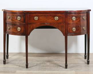 289	Burled Mahogany Hepplewhite Sideboard	"Burled mahogany Hepplewhite sideboard. 19th century. Four drawers, later brass pulls, tapered legs with flared feet. Losses to veneer throughout front edges of top. Heavy scratches, marks, scuffs and wear throughout wood of top. Nicks, chips and scuffs to edges of wood on legs and feet. Refinishing to brass pulls.

60 1/4"" W  x 24 3/8"" D x 36 3/4"" H. 91 lbs."
