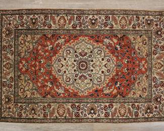 348	Persian Style Rug	"Persian style rug. Floral motifs and medallion against red and cream-colored field. Losses to fringe edges. Wear and slight creasing throughout rug. 

2' 11 5/8"" x 4' 5"". 7 lbs."
