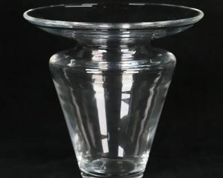 139	Steuben Crystal Vase	Signed Steuben modern art glass vase. 8 3/4"H x 9 1/8"-diameter at top. Scratches to the underside.
